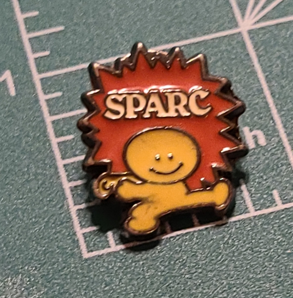 SPARC Collectible Pin with Orange and Yellow Design - Picture 3 of 5